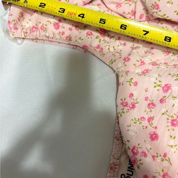 women's mini dress with puff sleeves and a pink floral print. - Picture 7 of 8